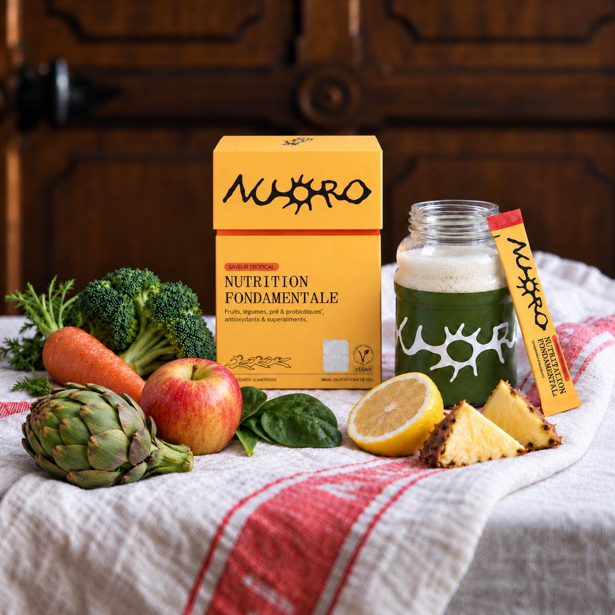 NUORO : boîte, stick et boisson entourés de fruits et légumes
