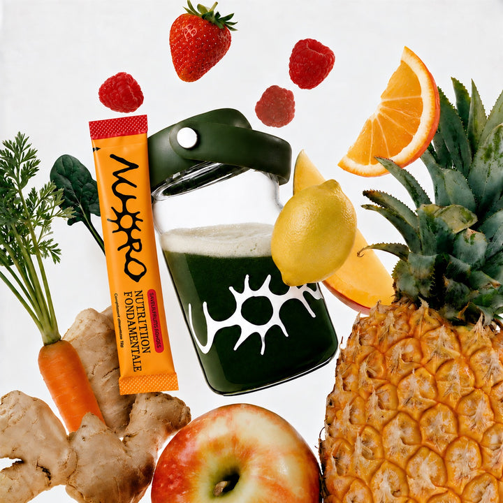 Stick et verre de NUORO entourés de fruits et légumes bio
